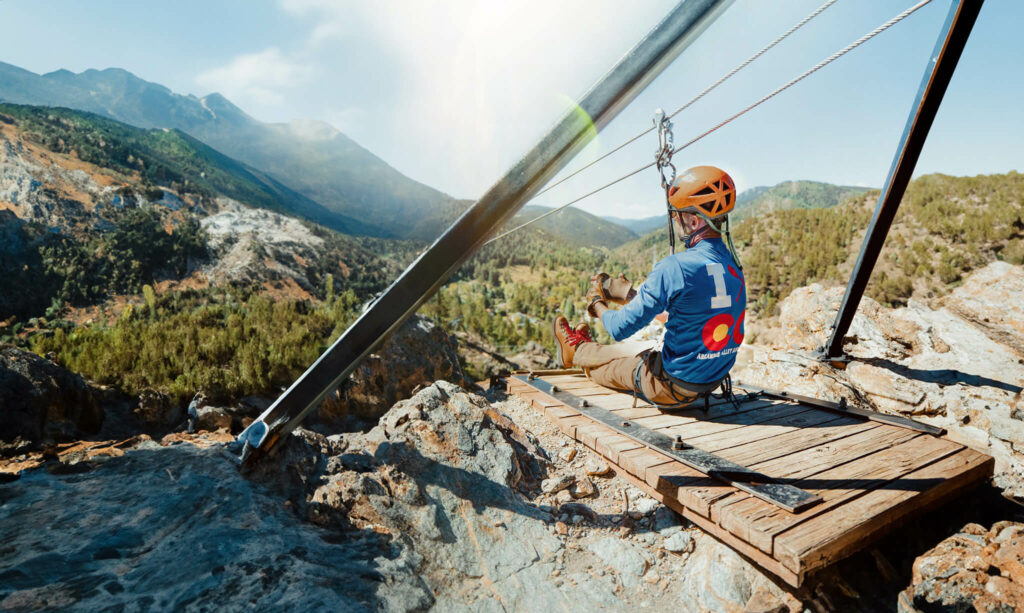 Prepping to zipline in the Colorado mountains.