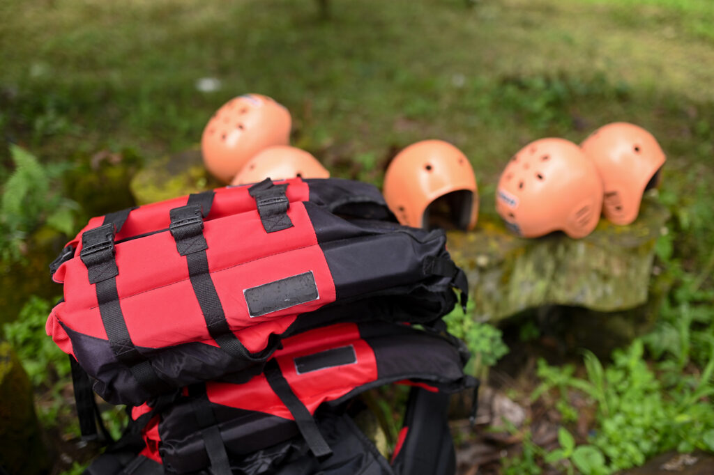 Rafting gear set along side the launch point.