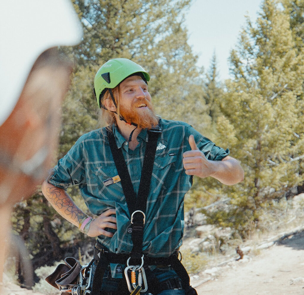 AVA Guide on a rock climbing adventure.