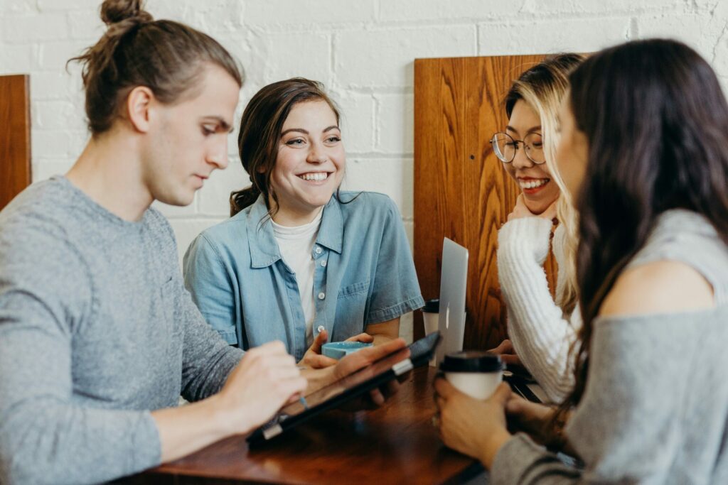 office group gathered around a table