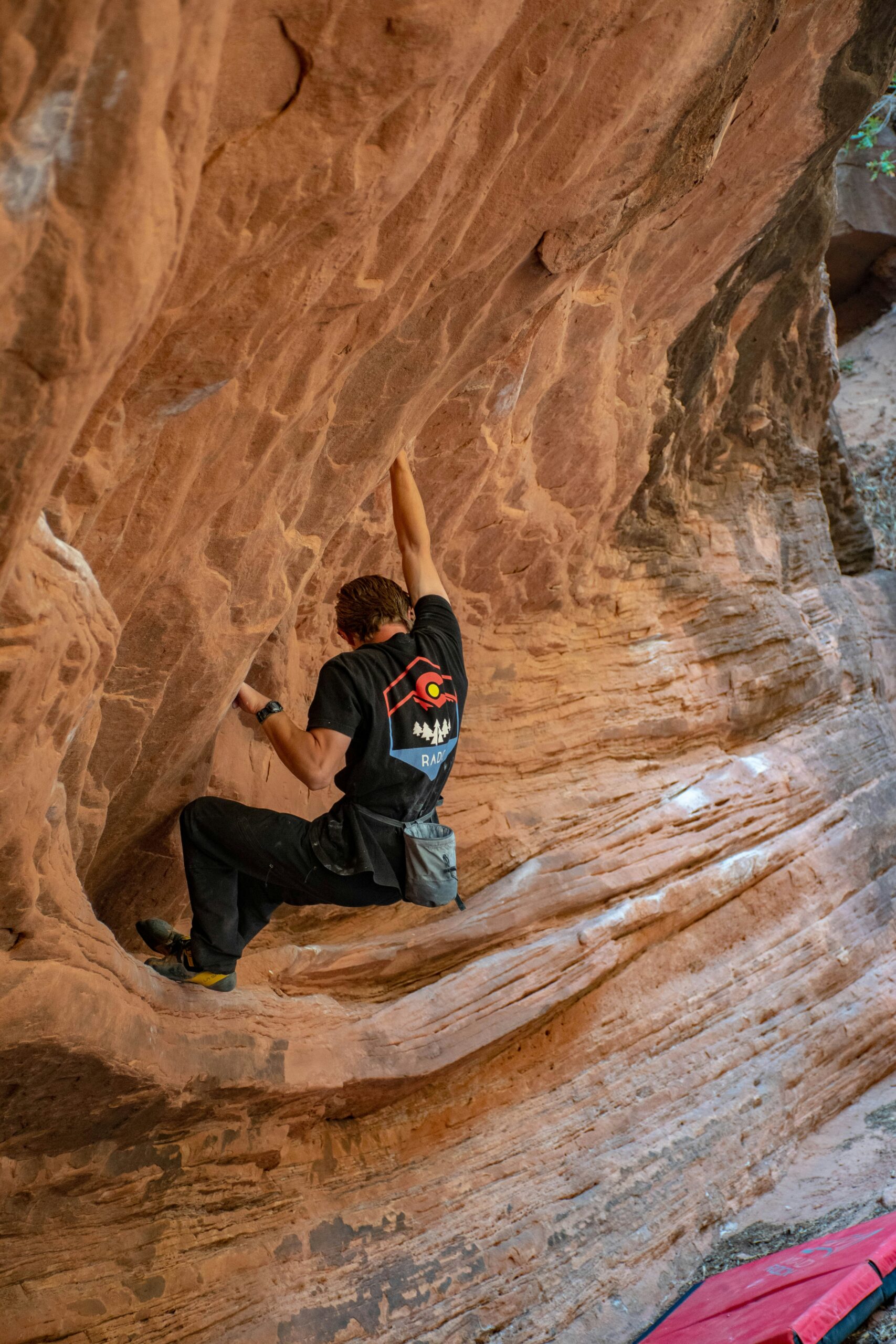 man climbing outside